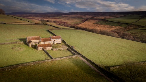 The exterior of High Lidmoor Farmhouse and the surrounding fields, Yorkshire